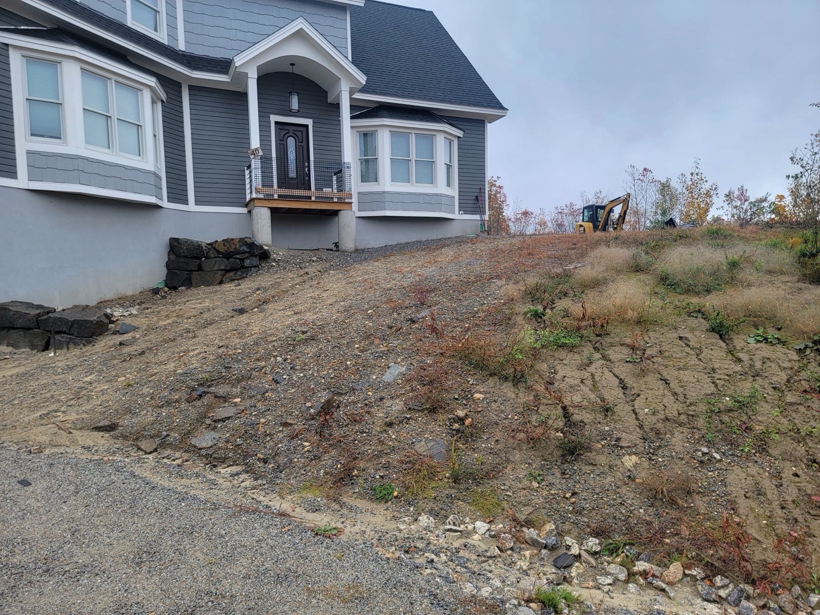 Hillside Property before Tyler Lawn Care work